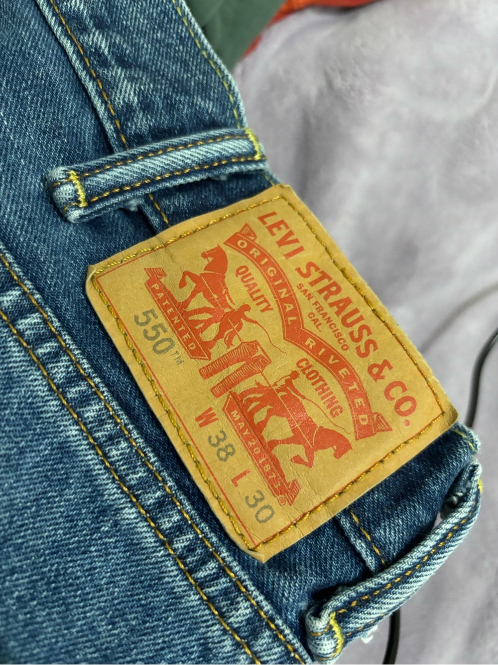 Levi's 550 Relaxed Fit Jeans in Blue with Tan Patch